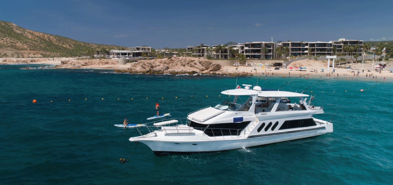 Luxury yacht sailing on the Sea of Cortez in Cabo San Lucas.
